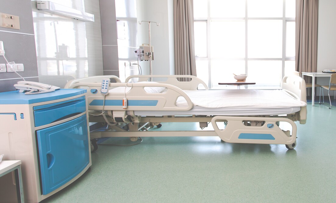 Recovery Room with beds and comfortable medical. Interior of an empty hospital room. Clean and empty room with a bed in the new medical center